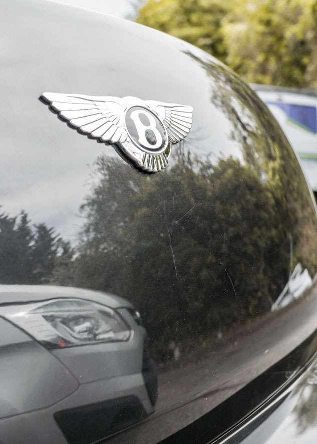 Close up shot of Bentley Flying Spur car with scratches on the boot